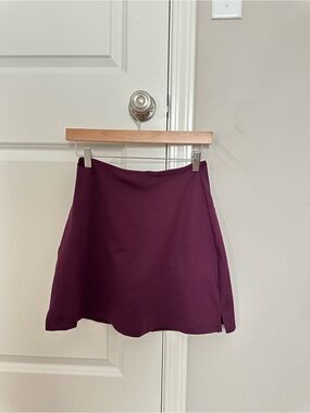 girlfriend collective skort in plum color